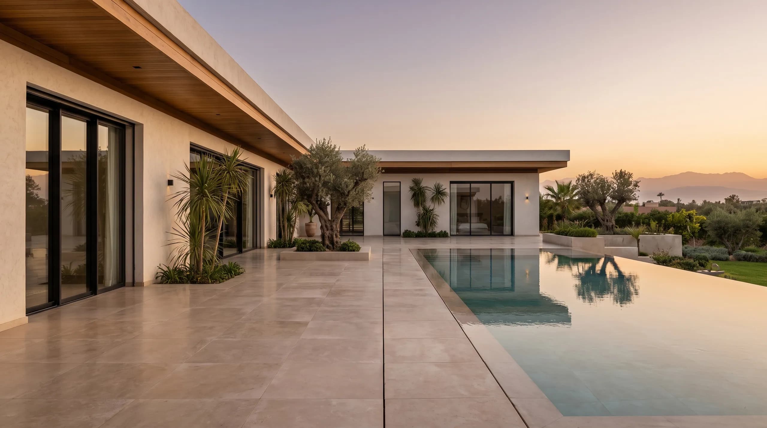 The protected villa estate at golden hour — what every plan ultimately buys